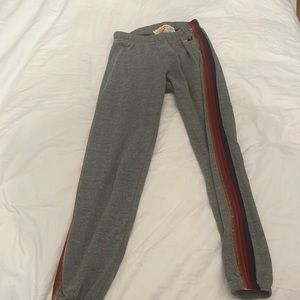 Aviator nation sweatpants. Size small. 2 strips with red, orange, blue, yellow.